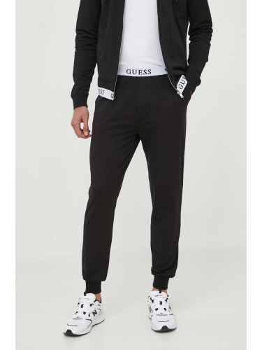 Спортен панталон Guess в черно с изчистен дизайн U3YB00.KBS91