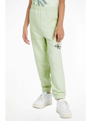Детски спортен панталон Calvin Klein Jeans в зелено с изчистен дизайн