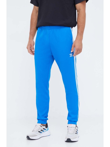 Спортен панталон adidas Originals  Classics SST Track Pants в синьо с апликация  IM4542