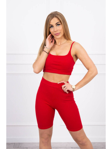 Complete with red high-waisted trousers