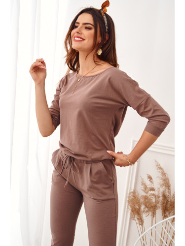 Women's jumpsuit fastened at the back with a cappuccino zip