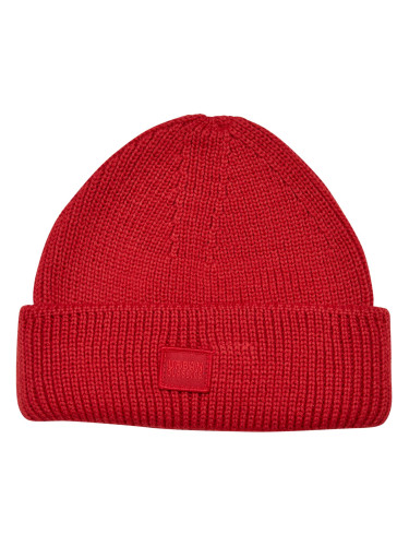 Knitted woolen hat with a large volume