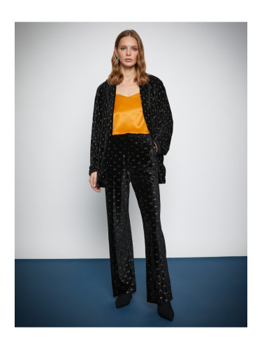 Koton Melis Ağazat X - Панталон от рипсено кадифе с широк крачол и ластик на талията.