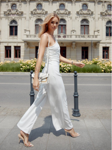 Elegant one-shoulder overall with ecru wide legs