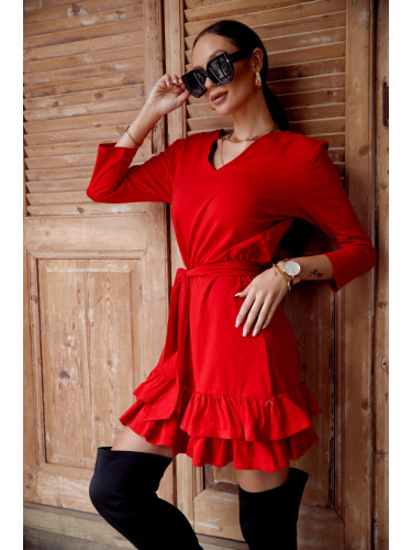 Simple dress with ruffles and a red belt