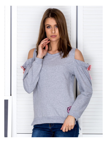 Light grey hoodie with cut-outs on the shoulders and bows