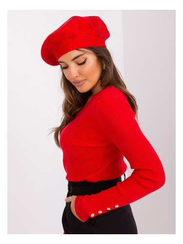 Red women's beret with appliqué