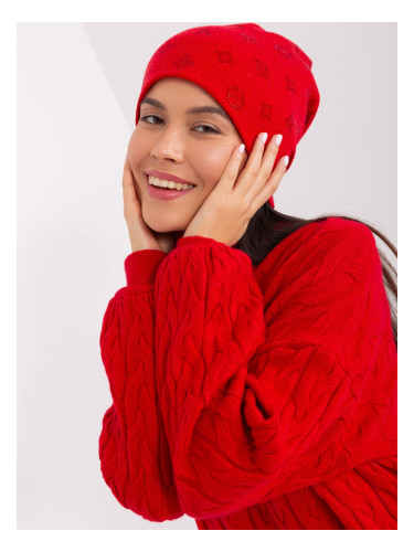 Red winter hat with appliqués