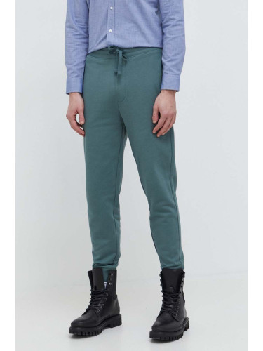 Памучен спортен панталон HUGO в зелено с изчистен дизайн 50489617