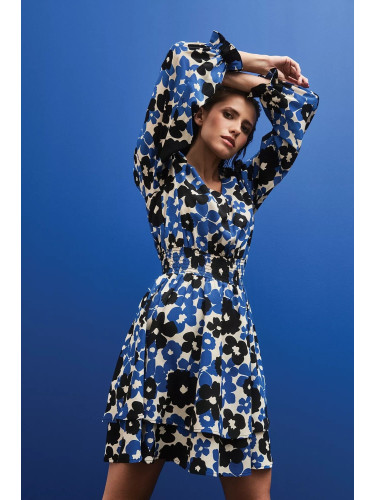 Marisse Blue Dress With A Flared Bottom And A Floral Pattern