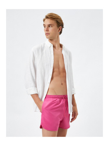 Koton Swimsuit Shorts Short waist with a tie-down pocket.