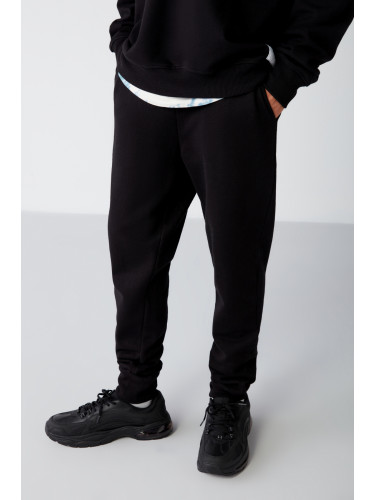 GRIMELANGE Jeremiah Men's Regular Leg Stretchy Fabric Black Sweatpants with Lanyard Waist and Elastic Pockets
