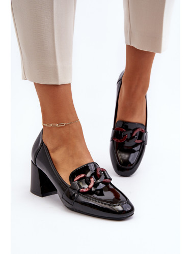 Black Paliotte pumps with chain