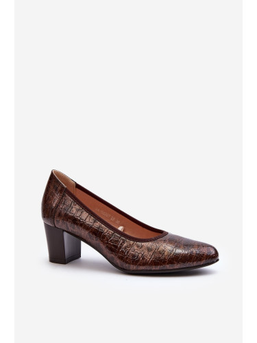 Pumps with embossed brown tin