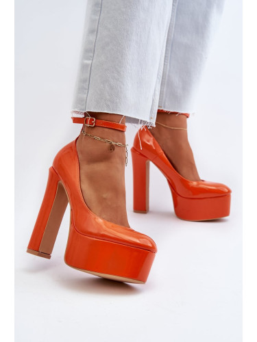 Patented pumps with a massive platform and heel, Orange Ninames