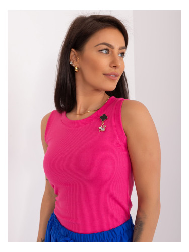 Women's dark pink top with decorative brooch