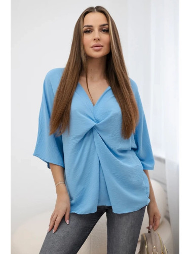 Large blue blouse with neckline