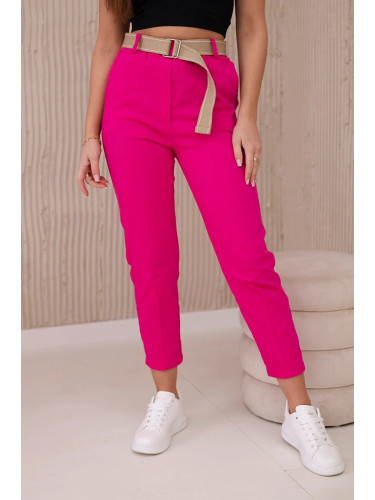 Fuchsia-coloured trousers with wide belt