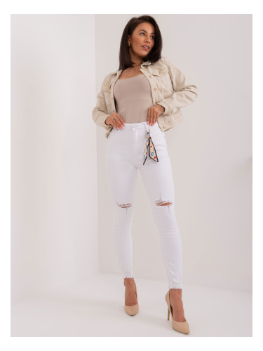 White fitted jeans with scuffs