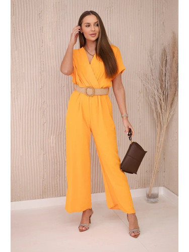 Jumpsuit with a decorative belt at the waist in orange color