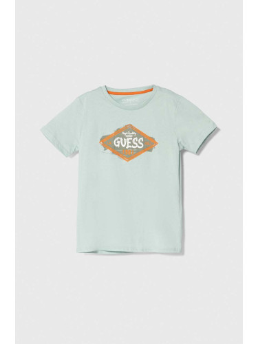 Детска памучна тениска Guess в тюркоазено с принт