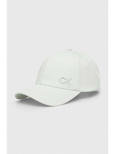 Памучна шапка с козирка Calvin Klein в зелено с апликация K60K612000