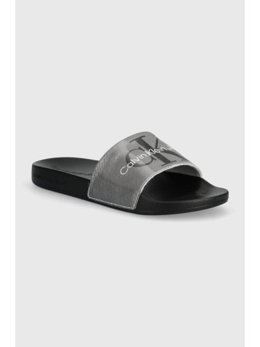 Чехли Calvin Klein Jeans SLIDE LENTICULAR ML WN в черно YW0YW01403