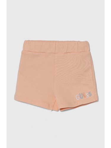 Детски памучен къс панталон Guess в оранжево с апликация