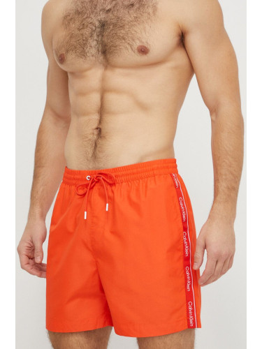 Плувни шорти Calvin Klein в оранжево KM0KM00955