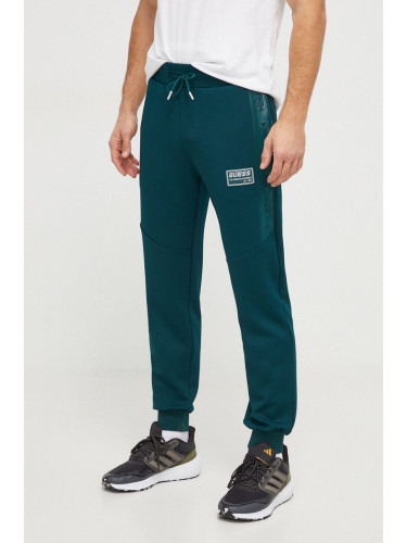Спортен панталон Guess GASTON в зелено с апликация Z4RB00 KBO62