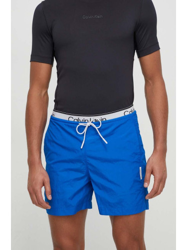 Къс панталон за трениране Calvin Klein Performance в синьо