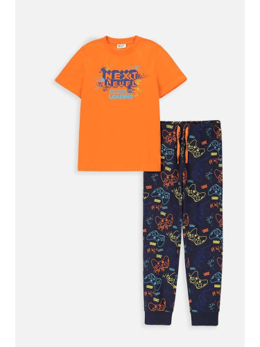 Детска памучна пижама Coccodrillo в оранжево с десен