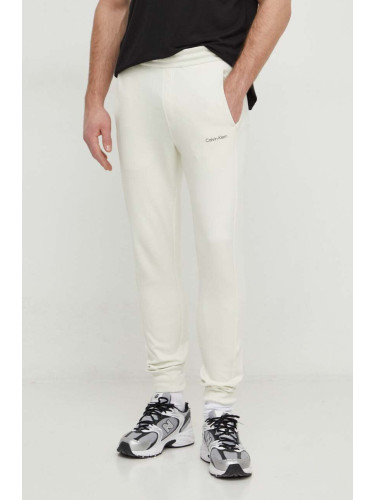 Спортен панталон Calvin Klein в бежово с изчистен дизайн K10K109940