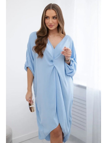 Blue oversize dress with a decorative neckline