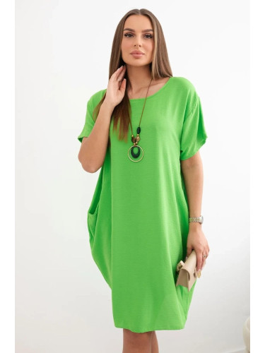 Dress with pockets and pendant Pistachios
