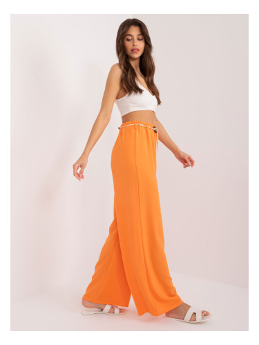 Orange trousers made of straight fabric