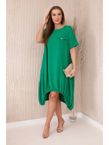 Oversized dress with green pockets
