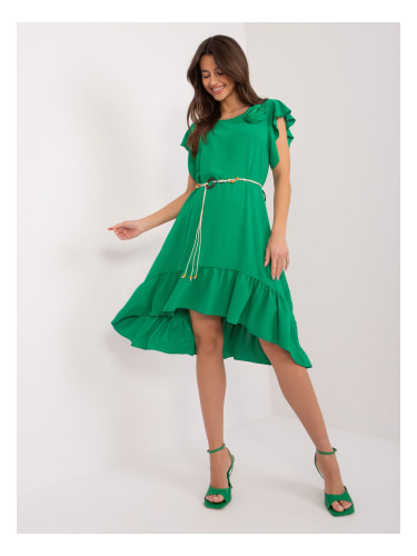 Green dress with ruffles and flower