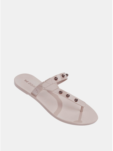 Pale pink flip-flops with zaxy spike pink-gold details