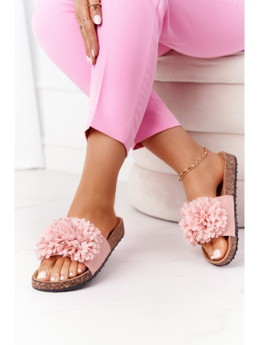 Flip-flops on a pink flowerbomb cork sole