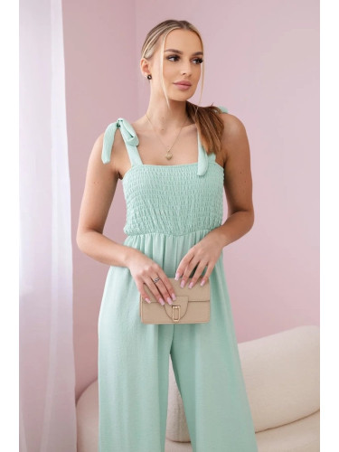 Waisted jumpsuit with a pleated top in dark mint colour