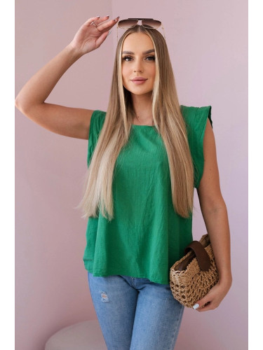 Cotton blouse with a delicate green ruffle