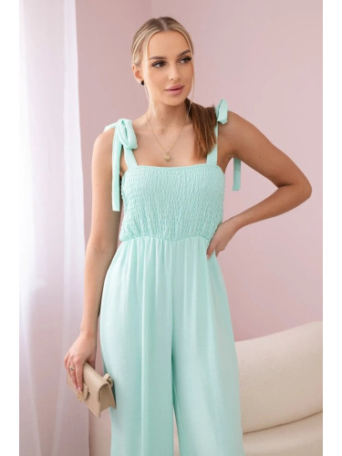Waisted jumpsuit with a pleated mint top