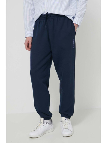 Памучен спортен панталон Tommy Jeans в тъмносиньо с изчистен дизайн DM0DM18378