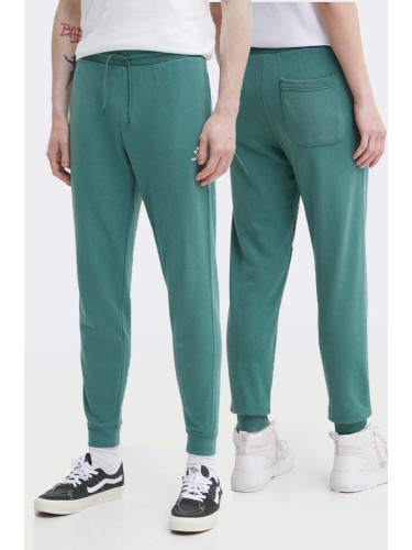Спортен панталон Converse в зелено с изчистен дизайн