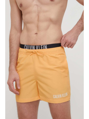 Плувни шорти Calvin Klein в оранжево KM0KM00992