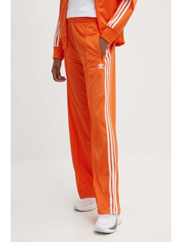 Спортен панталон adidas Originals в оранжево с апликация IP0640