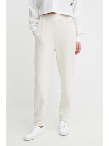 Спортен панталон Calvin Klein в бежово с изчистен дизайн K20K206632
