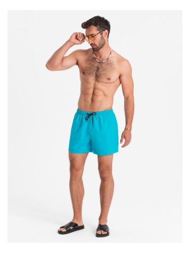 Ombre Neon men's swim shorts with magic print effect - turquoise