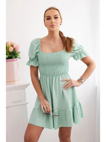 Women's dress with ruffles and pleats - mint